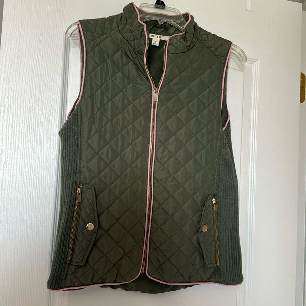 Green and pink vest